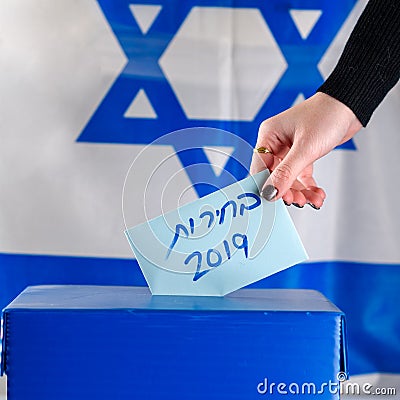 Israeli woman votes at a polling station on election day.Close up of hand. Stock Photo