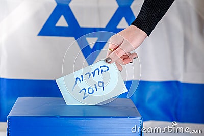 Israeli woman votes at a polling station on election day.Close up of hand. Stock Photo