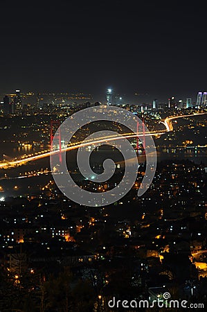 Istanbul city lights and bosphorus bridge Stock Photo