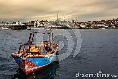Istanbul landscape, small boat sea, mosque and Galata Bridge Stock Photo