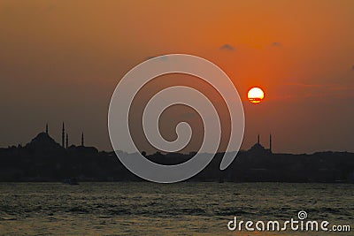 Maiden`s tower and Haydarpasa railway station, sunset and long exposure photos. Stock Photo