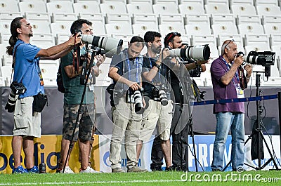 Istanbul, Turkey - August 14, 2019: Photojournalists and sports photographers shoot with cameras training session before the UEFA Editorial Stock Photo