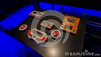 Old portable Nintendo game watch Mario Bros, Donkey Kong, Octopus in Istanbul, Turkey, in Digital Revolution exhibition Editorial Stock Photo