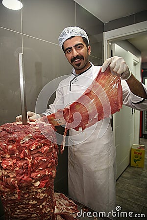 A chef preparing Turkish Doner Kebab Editorial Stock Photo