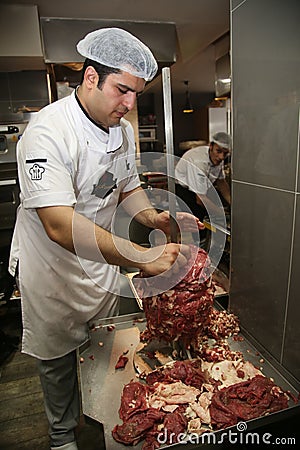 A chef preparing Turkish Doner Kebab Editorial Stock Photo