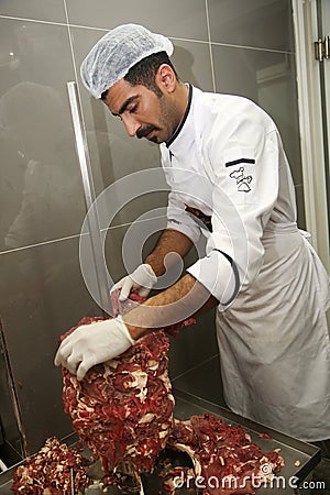 A chef preparing Turkish Doner Kebab Editorial Stock Photo