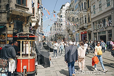 Istanbul, Turkey - May 02, 2023: Nostalgic traditional red tram in Beyoglu. The tram line runs along Istiklal Editorial Stock Photo