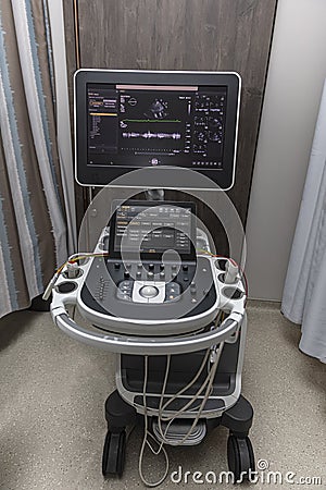 Istanbul, Turkey - September 20, 2022 ; Doctor examining patient using ultrasound scanner machine. Passes the ultrasound sensor Editorial Stock Photo