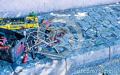 Mechanic tools laying on sidewalk Editorial Stock Photo
