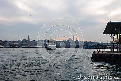 Istanbul view with ferry and Eminonu skyline. Editorial Stock Photo