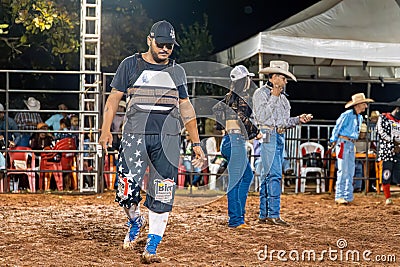 Itaja, Goias, Brazil - 04 21 2023: bull riding rodeo life saver Editorial Stock Photo