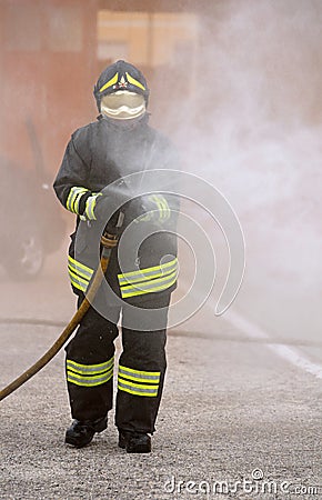 Italia, IT, Italy - May 10, 2018: italian fireman uses the hydra Editorial Stock Photo