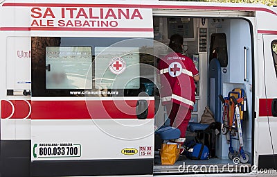 Italian ambulance. Red cross with nurse. Side view Editorial Stock Photo