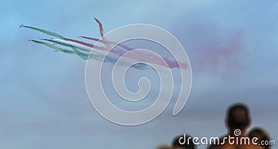 Planes jet with people looks at the italian tricolor arrows planes during an air show Vector Illustration