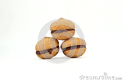 Italian biscuit Baci di Dama, lady kisses translated into English, on white background Stock Photo