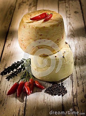 Italian cheese with hot chili Stock Photo