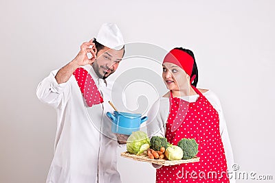 Italian Chief cook in Red Apron Shows OK Sign Stock Photo