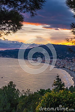 Italian coastline at dusk, Alassio summer destination Stock Photo