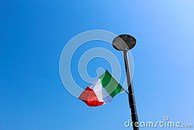 Italian flag on a modern public lamp Stock Photo