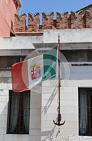Italian flag with the symbols of the Italian maritime republics Stock Photo