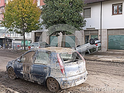 Italian floods aftermath, upturned car write-off Editorial Stock Photo