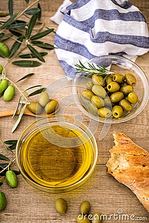 Italian food background with ciabatta bread, olive oil and olive Stock Photo