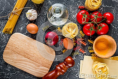 Italian food concept pasta ingredients on grey stone desk background top view mock up Stock Photo