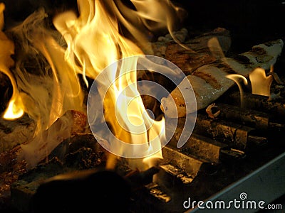 Italian food - fish and meat cooked on a live fire Stock Photo