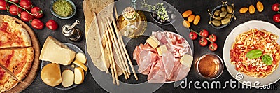 Italian food panorama. Pizza, pasta, cheese, ham, capers, wine, tomatoes Stock Photo