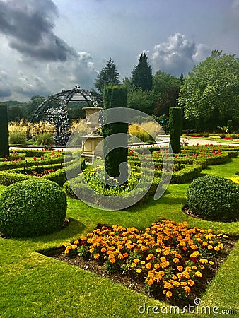 Italian garden and the clouds Editorial Stock Photo