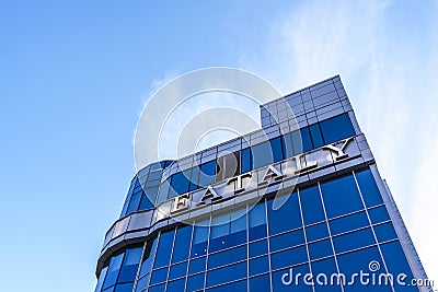 Italian gastronomic center EATALY on Kievskaya street. Signboard, logo, building facade. Editorial Stock Photo