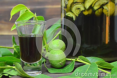 Italian green walnut liqueur Stock Photo