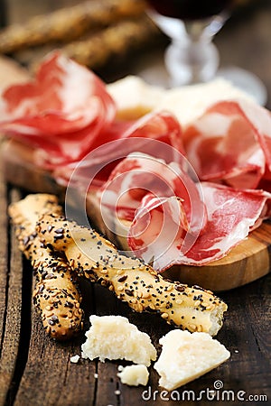 Italian ham with breadsticks Stock Photo