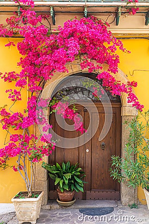 Italian house exterior with bougainvillea flowers on the wall in town Positano, Amalfi coast, Campania, Italy Stock Photo