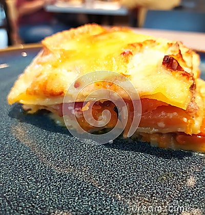 Italian lasagna with pumpkin on a plate, close-up. Stock Photo