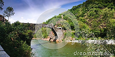 Italian historical bridge Ponte Del Diavolo Lanzo Torinese Stock Photo