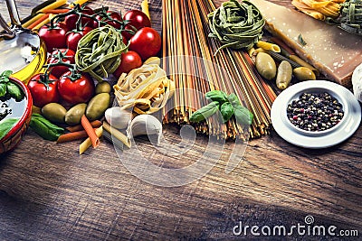 Italian and Mediterranean food ingredients on old wooden background. Stock Photo