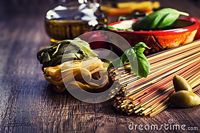 Italian and Mediterranean food ingredients on old wooden background. Stock Photo