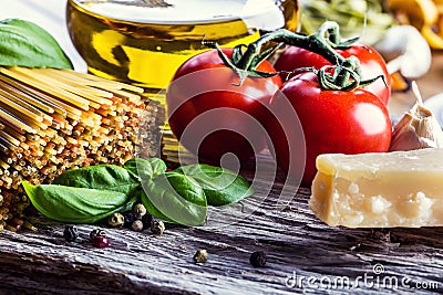 Italian and Mediterranean food ingredients on old wooden background. Stock Photo