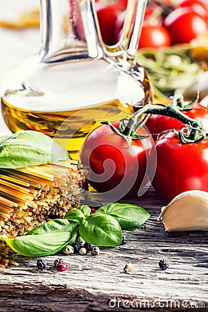 Italian and Mediterranean food ingredients on old wooden background. Stock Photo