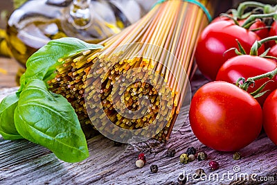 Italian and Mediterranean food ingredients on old wooden background. Stock Photo