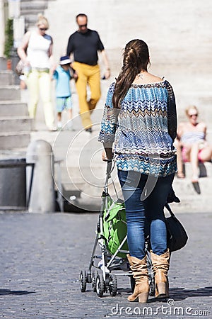 Italian mother and baby in a pram Editorial Stock Photo