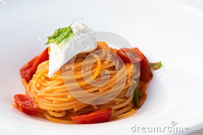 Italian pasta - spaghetti with mozzarella cheese closeup, mediterranean diet Stock Photo