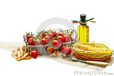 Italian Pasta with tomatoes, garlic, pepper,olive oil on a whit Stock Photo