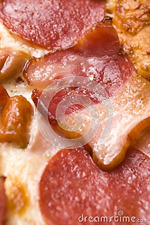 Italian pizza with bacon, salami and cheese Stock Photo