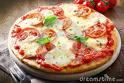 Italian pizza with melted cheese Stock Photo