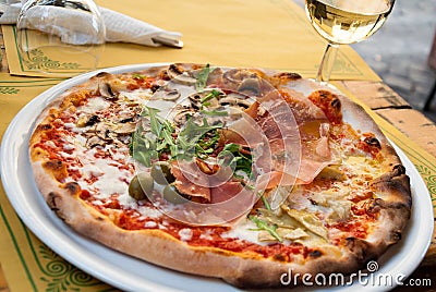 Italian pizza in street cafe Stock Photo