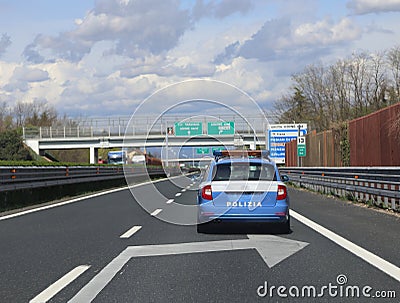 Italian police car patrolling runs fast on the freewat Stock Photo