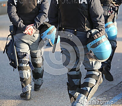 Italian police in riot gear with flak jackets and protective hel Stock Photo