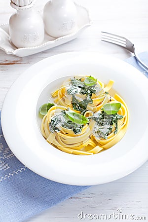 Italian ribbon pasta with gorgonzola sauce Stock Photo